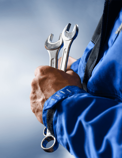 Close up of man holding tools