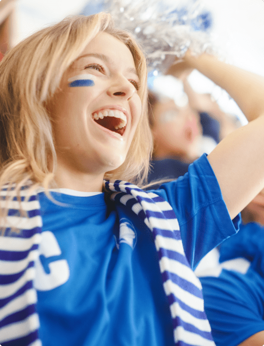 Women cheering at sports game